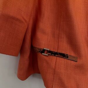 Orange 2 piece skirt suit